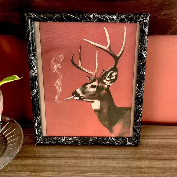 deer smoking a cigarette will smoke scare off The Sportsmen The Deer Has A Serious Expression And Is Holding A Cigarette In Its Right Hand With Smoke Curling Up From It Does smoking while deer hunting